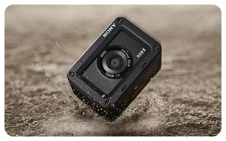 Sony RX0 II Camera falling and hitting a hard dusty surface causing a dusty cloud to form